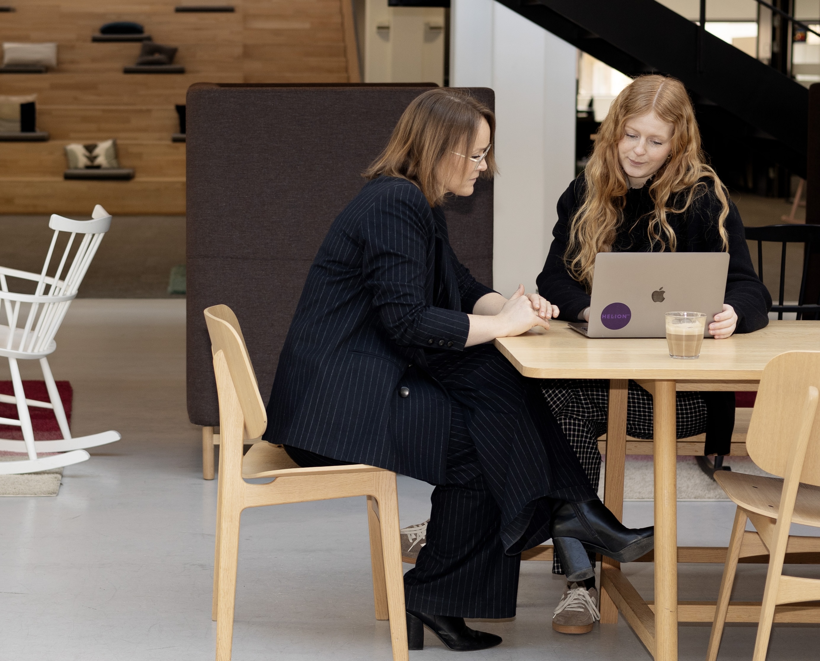Signe and Pernille sitting around a table