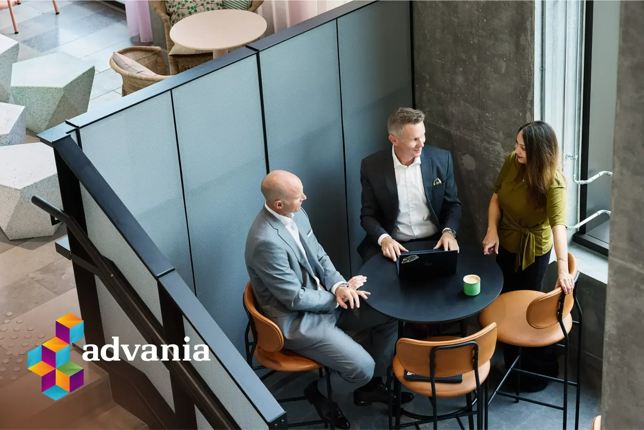 3 people sitting around a table